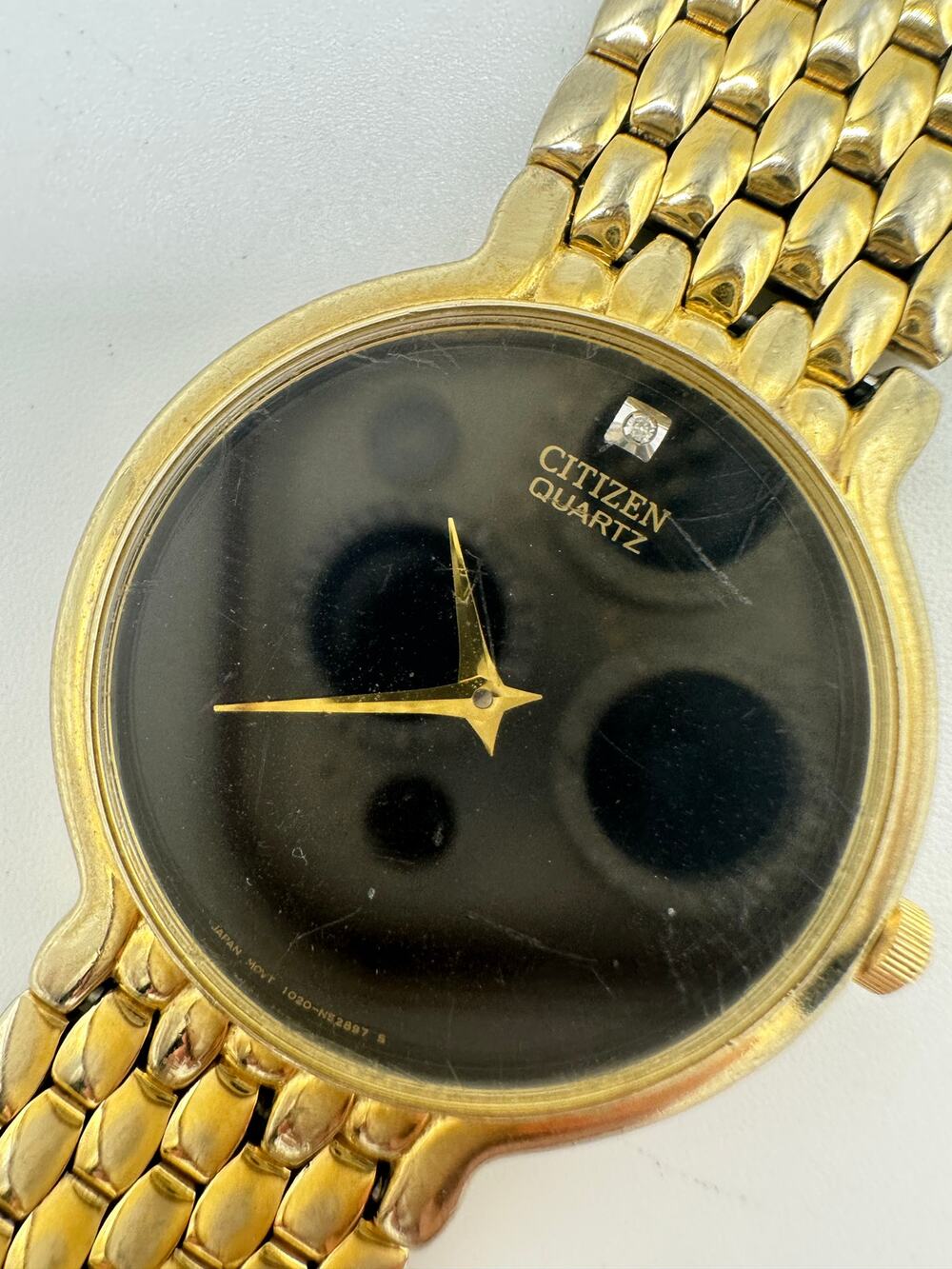 Citizen vintage 1020-954562 Quartz gold black round dial stainless steel watch
